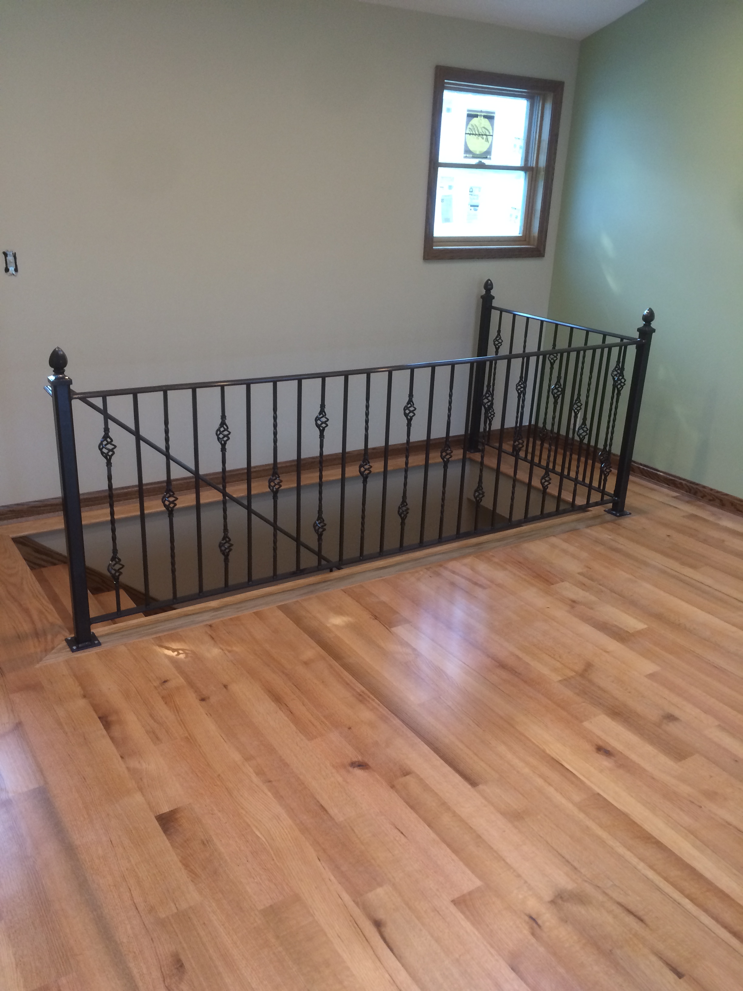 Interior wrought iron railing living room Schultz